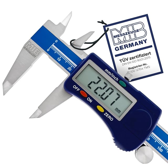 Calibre digital MIB Germany con LCD grande, patas cerradas sobre una pieza mecanizada