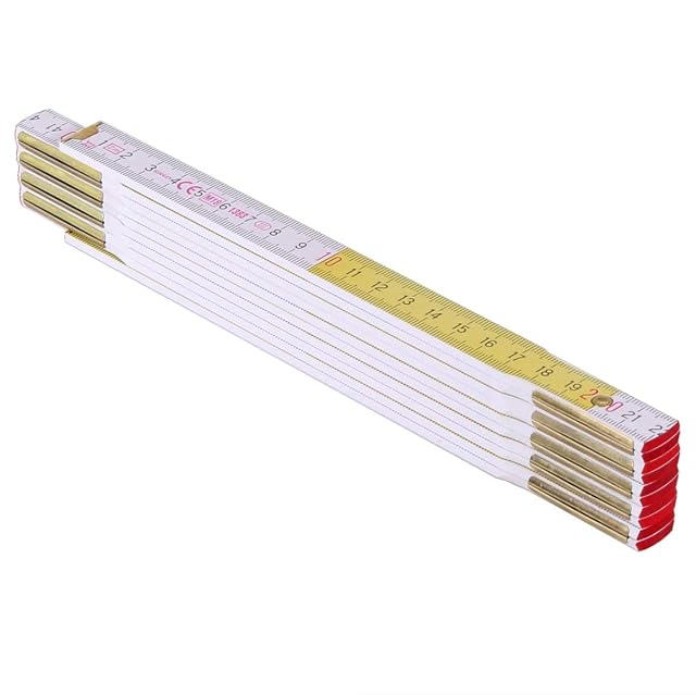 Metro plegable de madera Stanley parcialmente desplegado, con sus articulaciones de latón y su escala blanca y amarilla