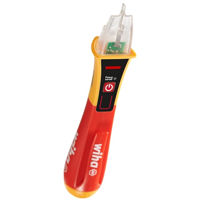 Detector Wiha Volt Detector apoyado contra un enchufe de pared